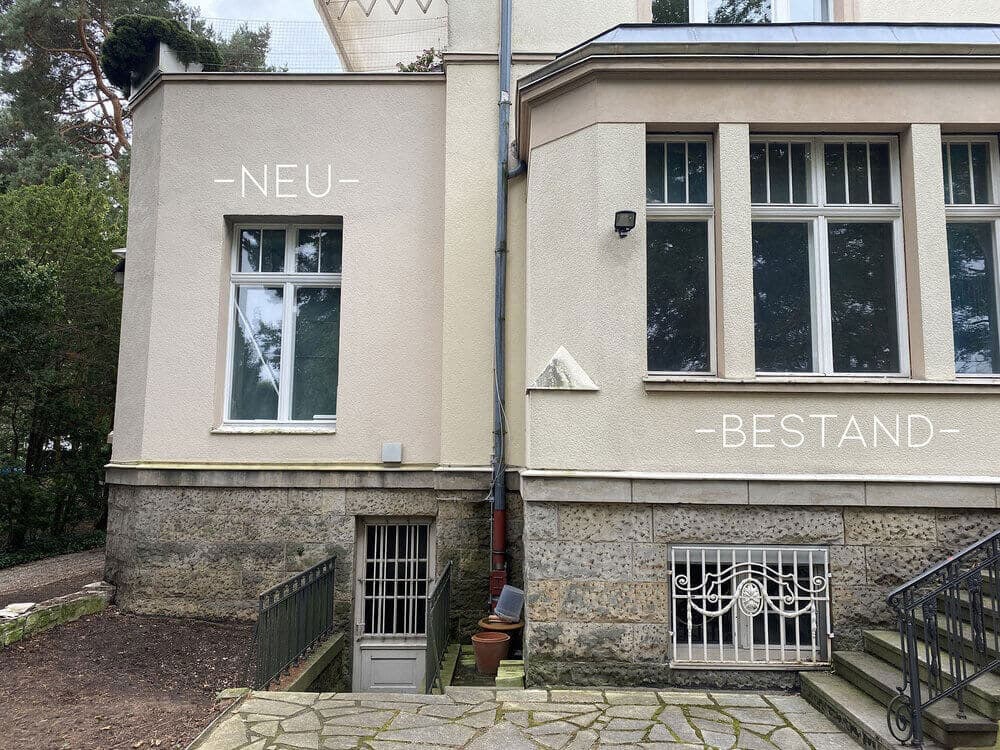 Haus mit Schriftzug Neubestand