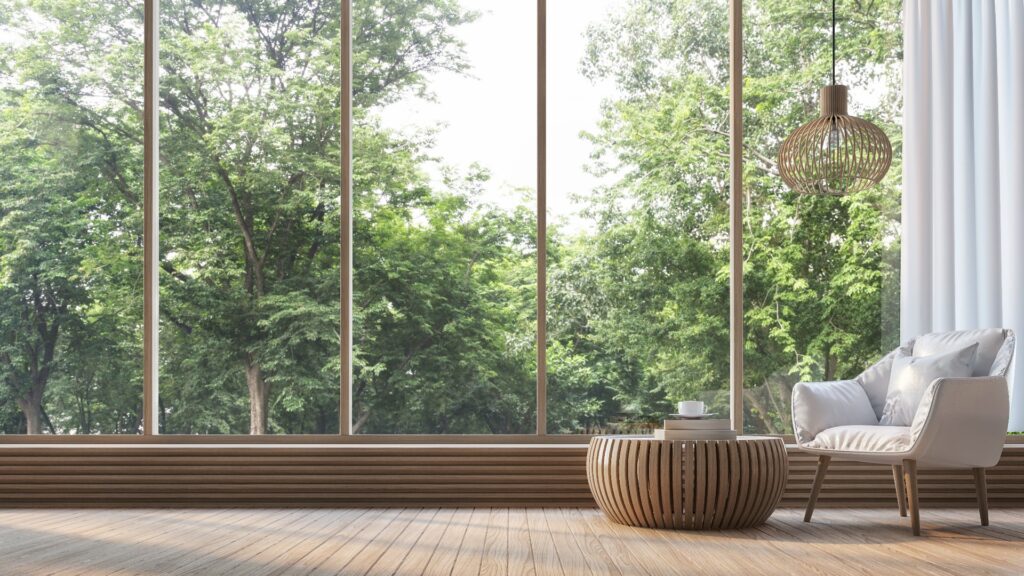 Modernes Wohnzimmer mit Blick auf die Natur 3d Rendering Image. Es gibt