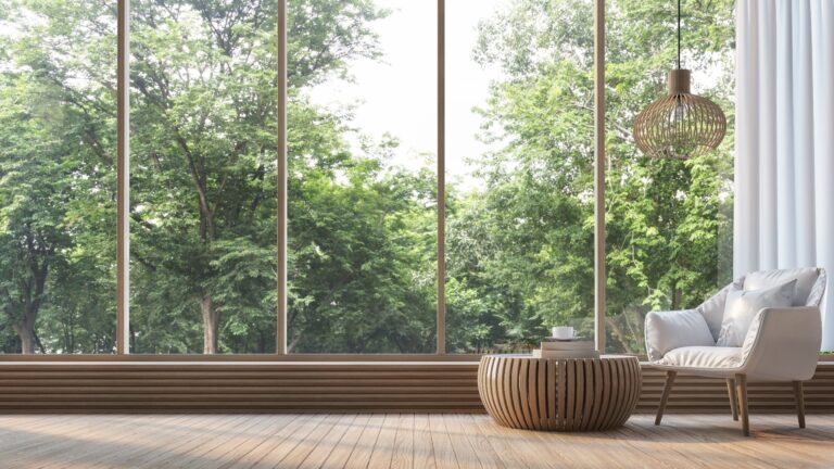 Modernes Wohnzimmer mit Blick auf die Natur 3d Rendering Image. Es gibt